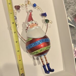 Festive Red and Green Ornament with Blue Accents